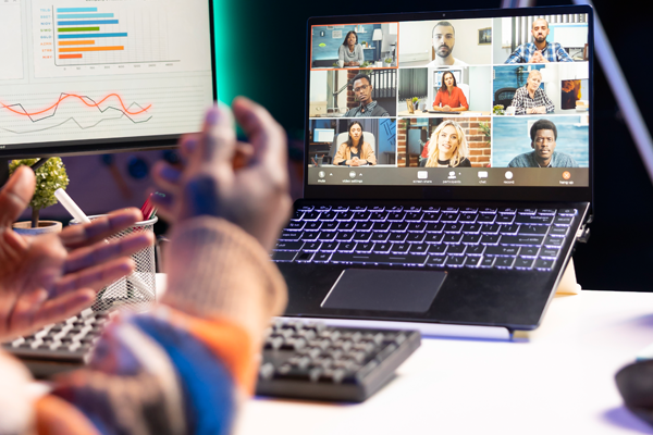 Man watching people on screen
