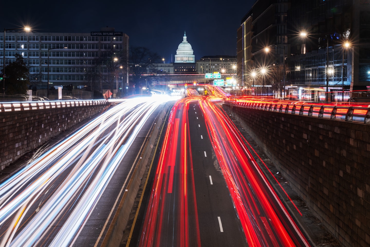 Roads at night with the U.S. capitol in the background