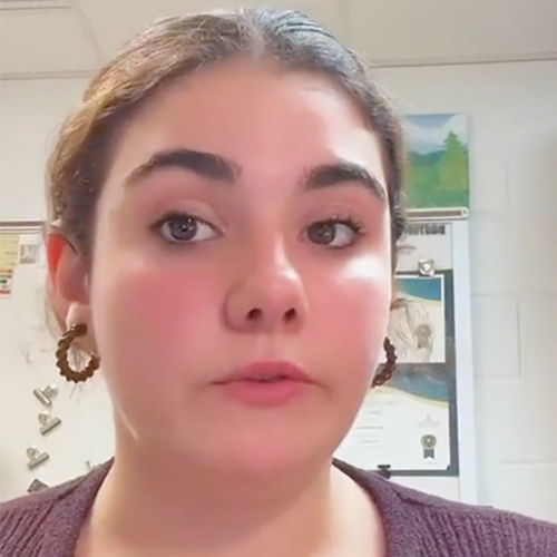 Young woman face close up