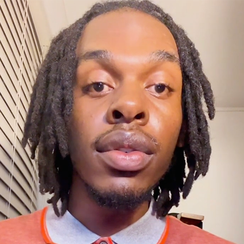 Young man looking at camera