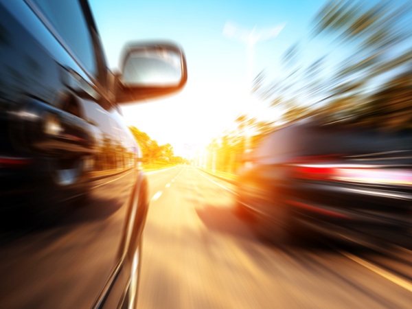 Car speeding so fast it's blurry