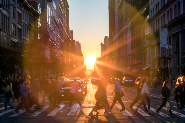 Pedestrians crossing the street in a crosswalk